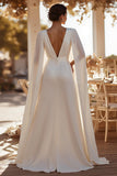 Vita djupa V-ringade brudjumpsuits med cape