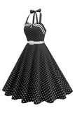 Prickiga halter svart A-linje 1950-talsklänning med rosett