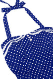 Prickiga halter svart A-linje 1950-talsklänning med rosett
